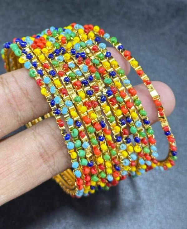 Multicolor Metal Bangle set 12pcs Bangles/Churhi set For Girls & Women Bangle Pearl Beads. Also available in Black & White Beads. All sizes Available.