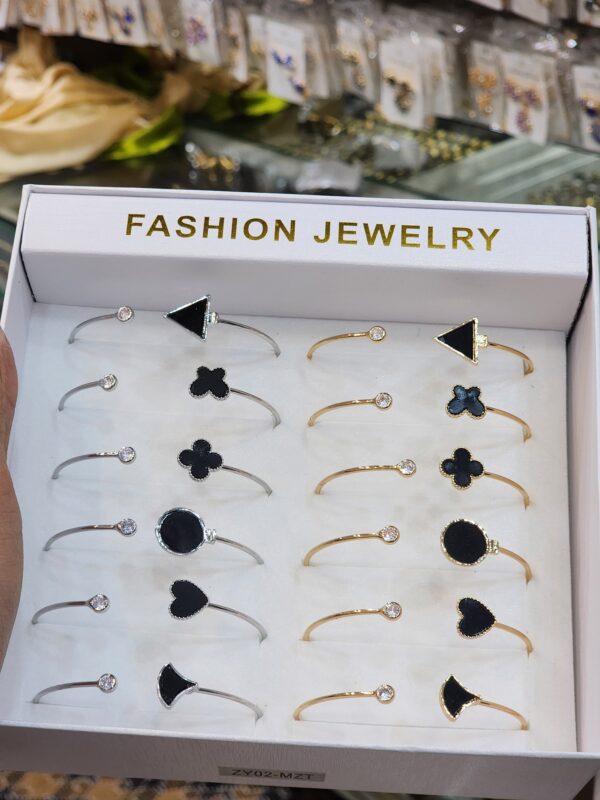 China Gold Handcuff Exclusive By Unique Fancy Jewellery For Women Available in Silver And Golden Colors With Black Stone (1 Pc). - Image 2