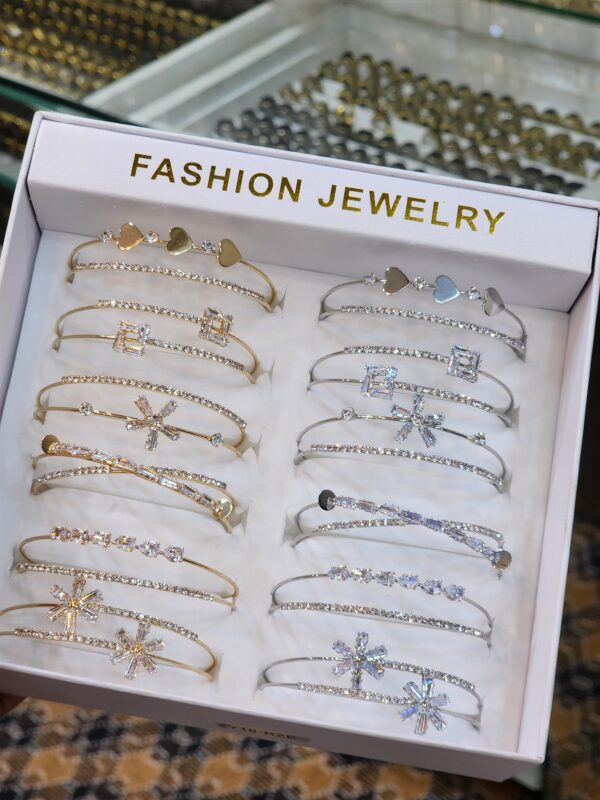 China Gold Handcuff Exclusive By Unique Fancy Jewellery For Women Available in Silver And Golden Colors with Different and Unique Designs (1 Pc).