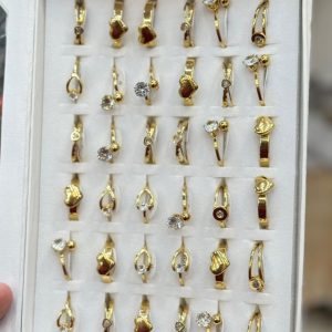 Stainless steel golden fancy rings For girls And Women (1 pc).