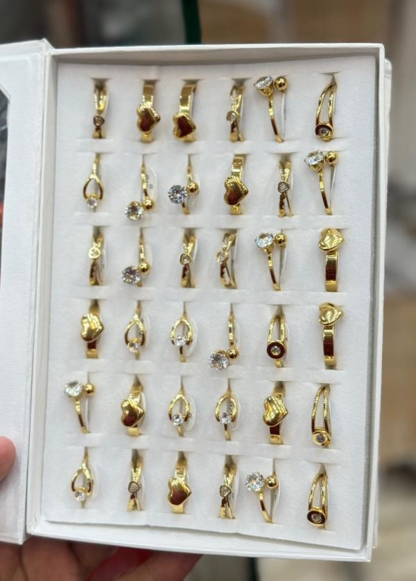 Stainless steel golden fancy rings For girls And Women (1 pc).